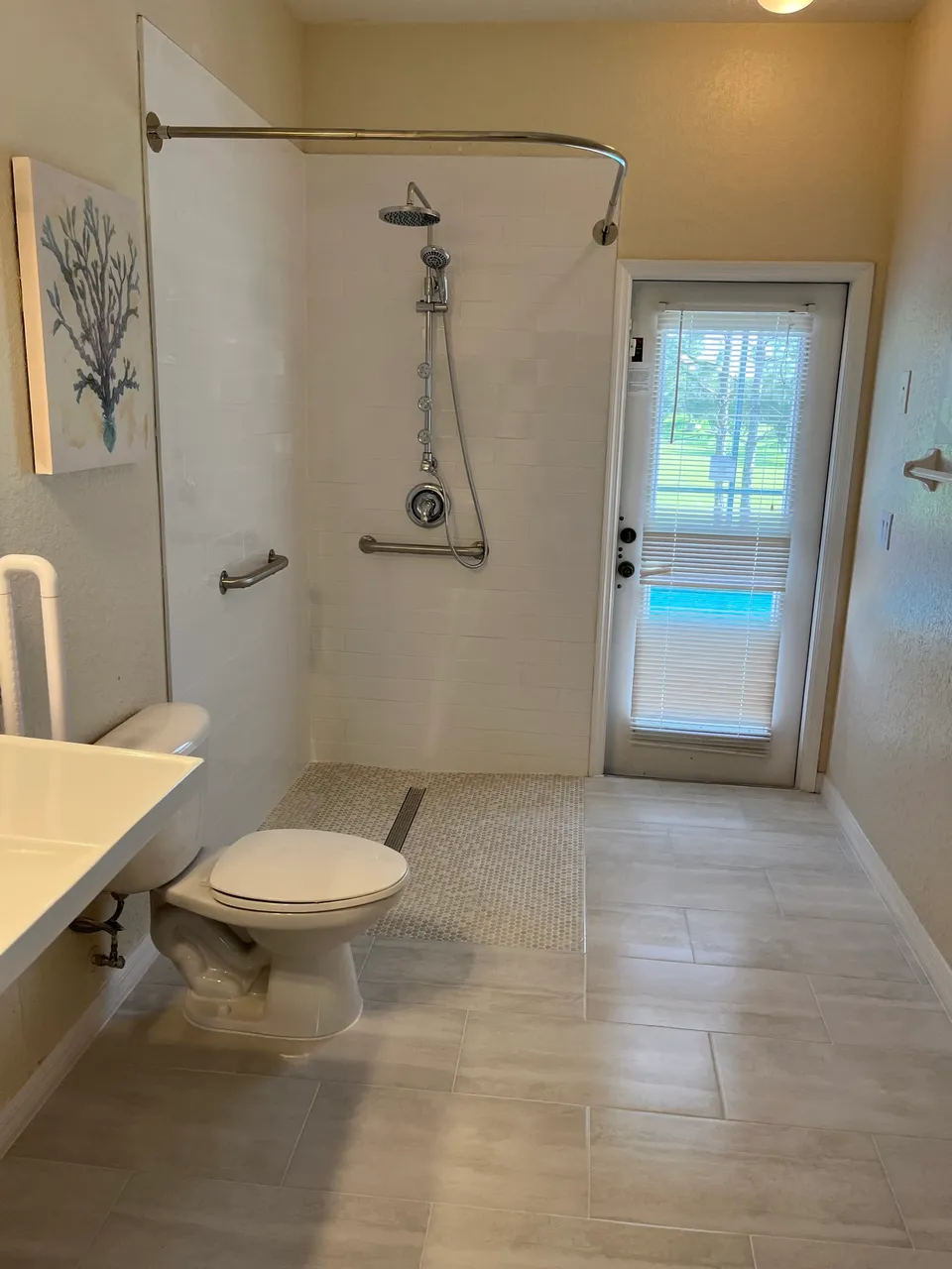 Finished accessible bathrooms by Contemporary Flooring & Bath in Orlando
