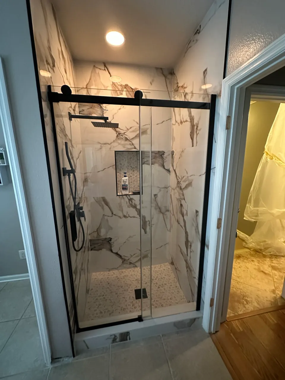 Finished tub-to-shower conversion by Contemporary Flooring & Bath